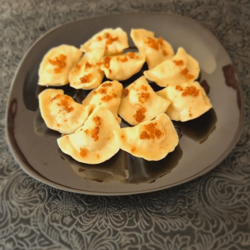 Pierogi z kapustą i pieczarkami 10 szt.