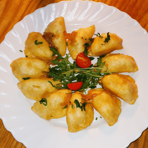 Opiekane pierogi z pieczarkami I serem