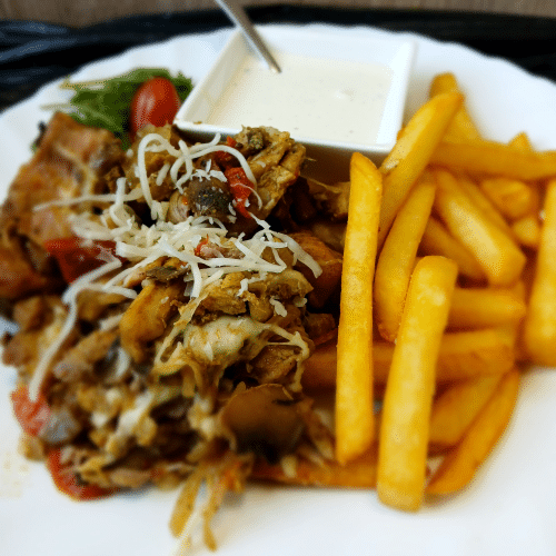 Shoarma drobiowa zapieczona serem , papryką ,pieczarkami