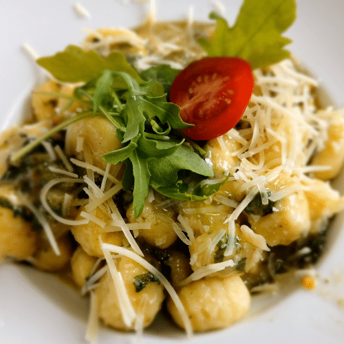 Pieczone gnocchi w sosie szpinakowo - serowym
