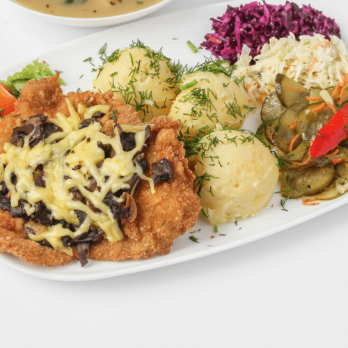 Kotlet schabowy zapiekany z serem i pieczarkami