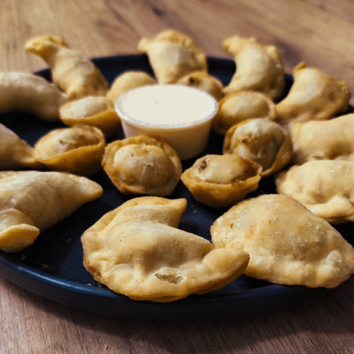 Pierogi z kapustą i pieczarkami 7 szt.