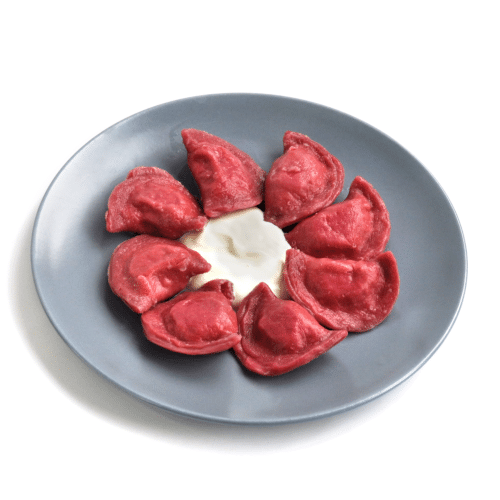 Pierogi firmowe z żółtym serem i pieczarkami