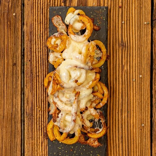 Frytki zakręcone  (250 g) zapiekane z serem