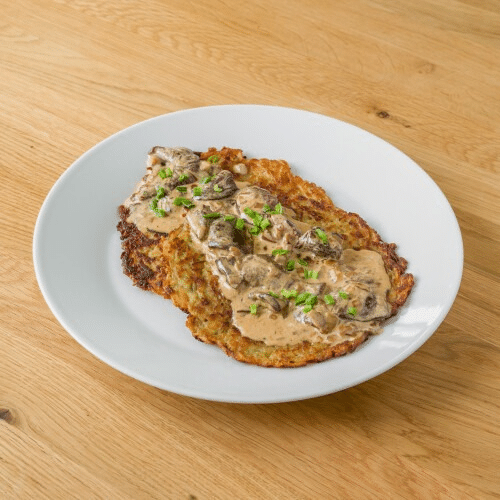 Placki ziemniaczane z sousem z pieczarkami